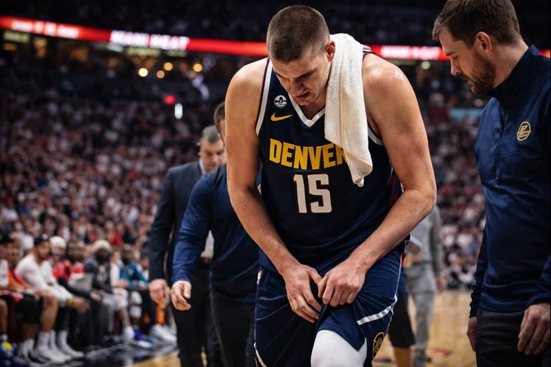 Nikola Jokic Suffers Left Knee Injury, Exits Nuggets Game vs Heat